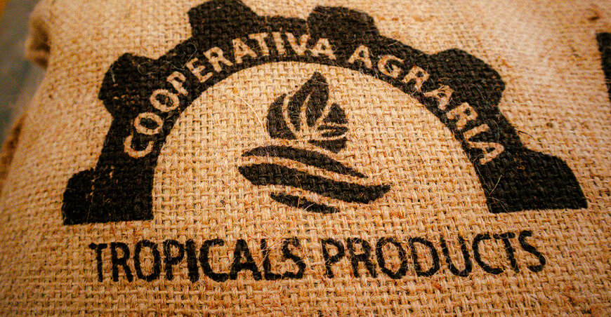 Cooperativa Agraria Tropicals Products de Pichanaqui exporta café verde a Dinamarca con respaldo de Devida Perú